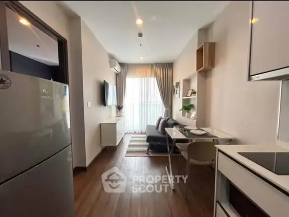Modern living room with sleek furniture and natural light