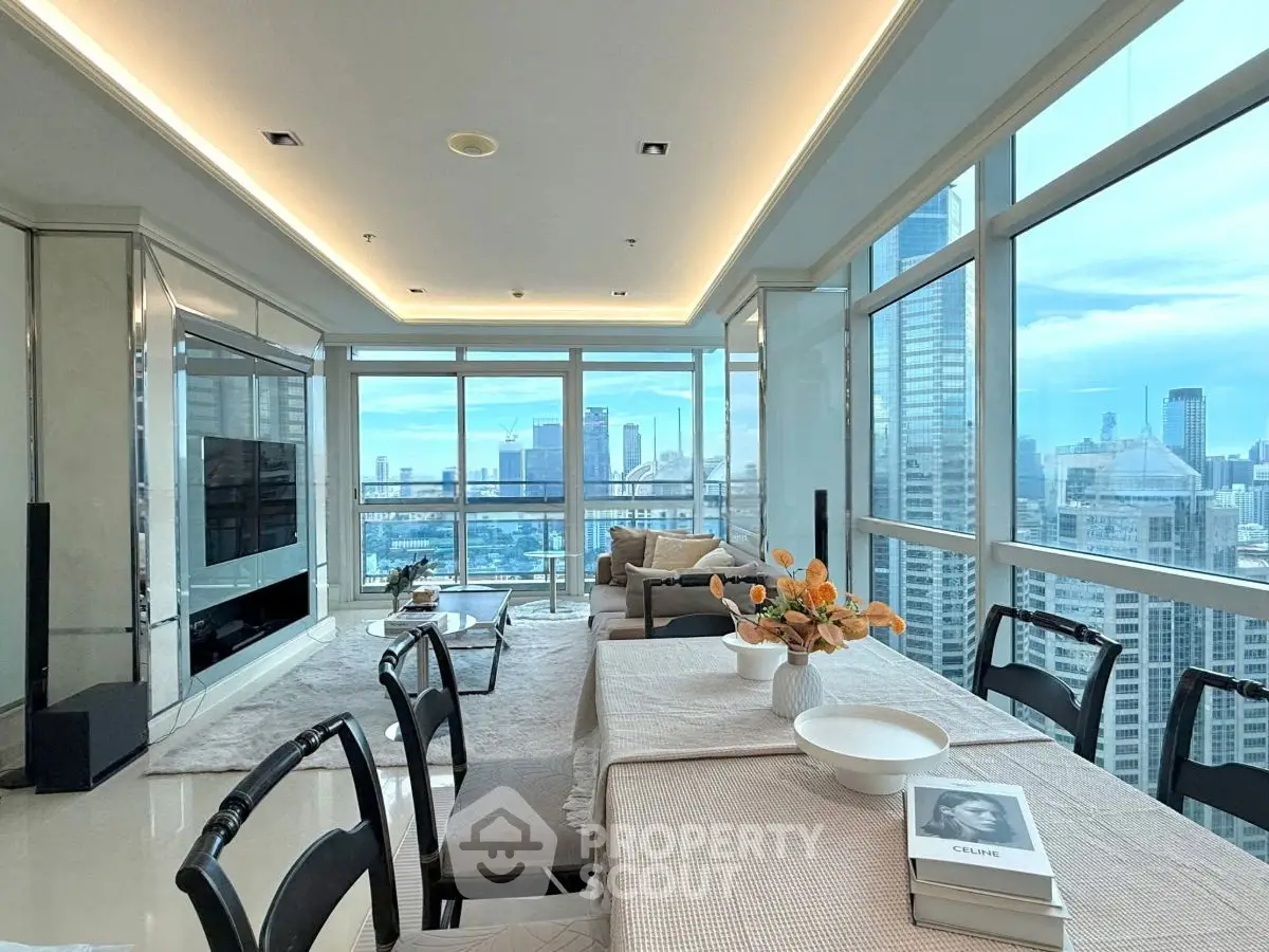 Luxurious living room with panoramic city views and elegant dining area.