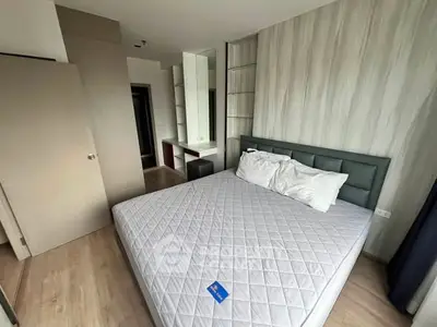 Modern bedroom with stylish decor and comfortable bed in a contemporary apartment.