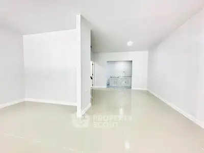 Spacious modern interior with glossy tiled floors and minimalist design, perfect for customization.