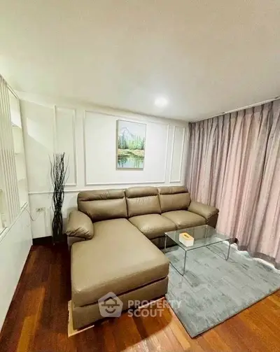 Cozy living room with modern sectional sofa and elegant decor