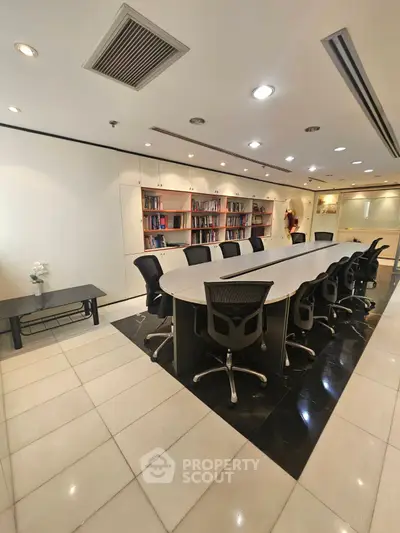 Spacious modern conference room with sleek design and ample seating