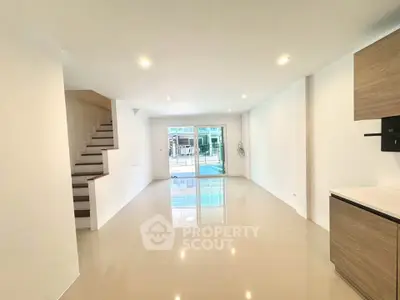 Spacious modern living room with open layout and natural light