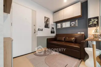 Modern living room with stylish decor and comfortable seating in a contemporary apartment.