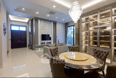 Luxurious living room with elegant chandelier and modern furniture