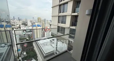 Stunning cityscape view from a modern high-rise balcony, perfect for urban living enthusiasts.