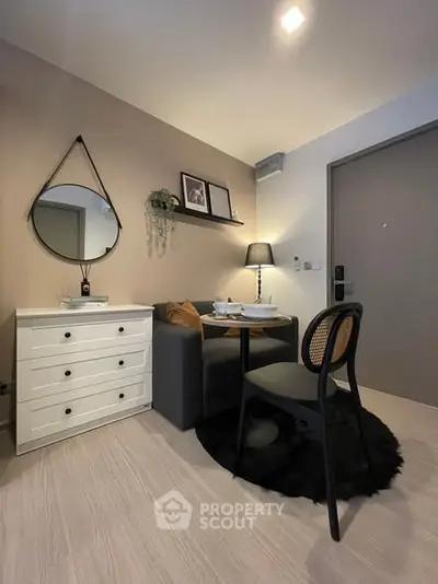 Cozy modern living area with stylish decor and dining setup