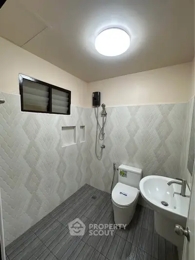 Modern bathroom with sleek fixtures and stylish tile design