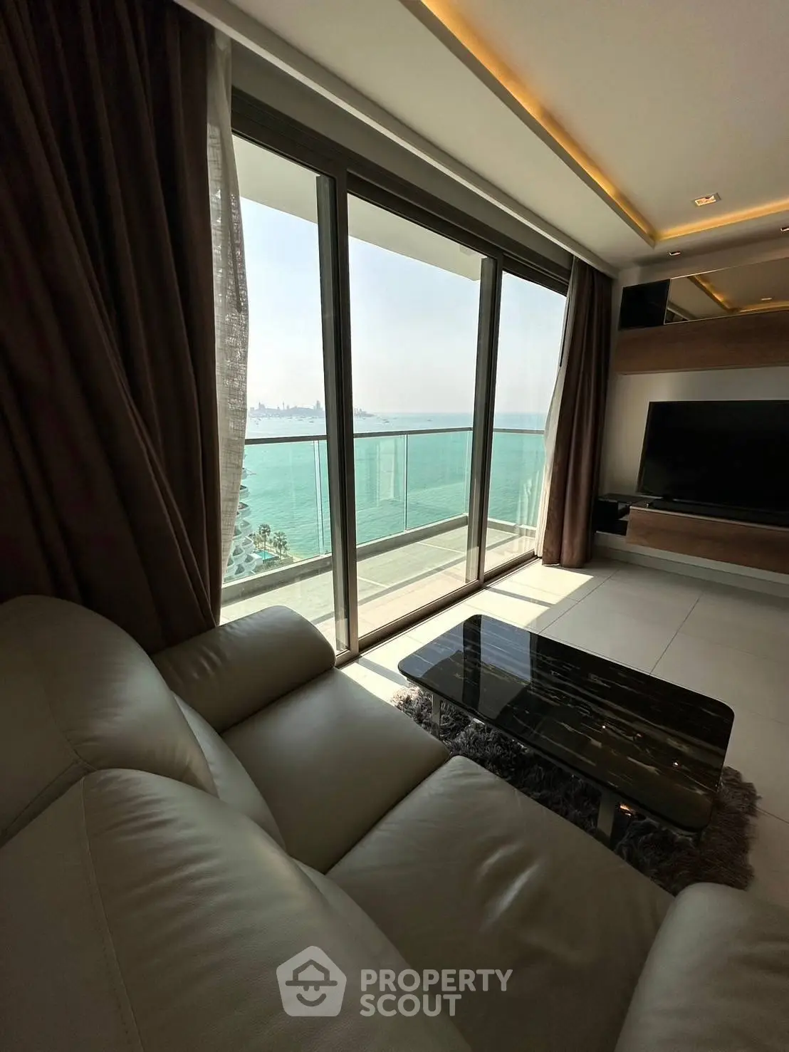 Luxurious living room with stunning ocean view and modern furnishings