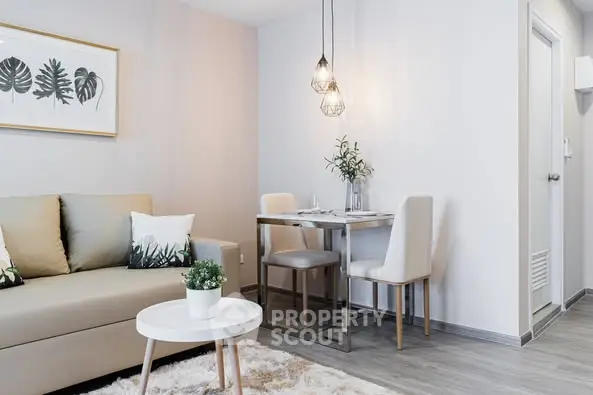 Modern living room with cozy dining area and stylish decor