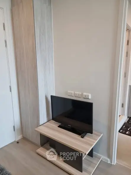 Modern living room with sleek TV stand and minimalist decor