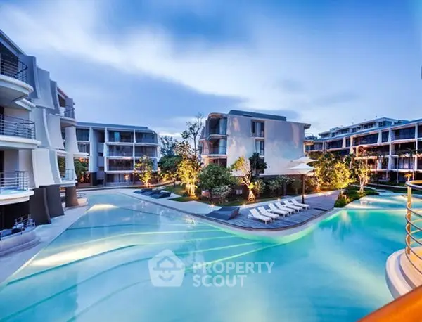 Luxurious modern apartment complex with stunning pool and landscaped gardens.