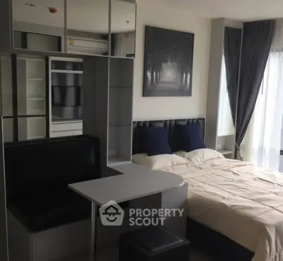 Modern studio apartment with stylish decor and natural light