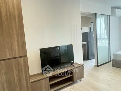 Modern apartment interior with sleek wooden furniture and open layout