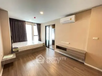 Spacious bedroom with modern design and natural light