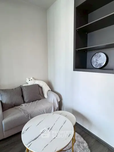 Cozy living room corner with modern decor and plush seating