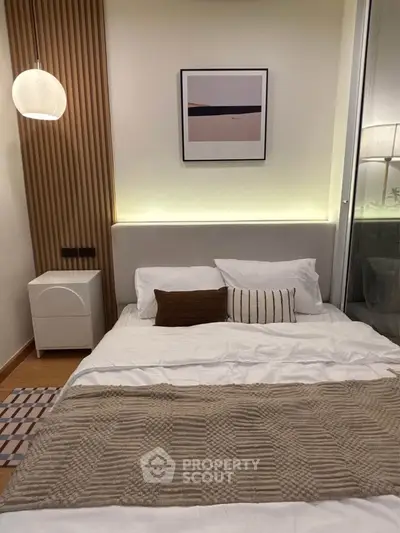 Cozy bedroom with modern decor and ambient lighting