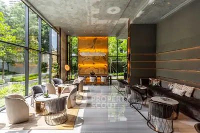 Luxurious modern living room with floor-to-ceiling windows and stylish furniture