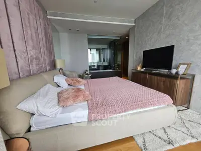 Luxurious bedroom with modern decor and large bed in stylish apartment
