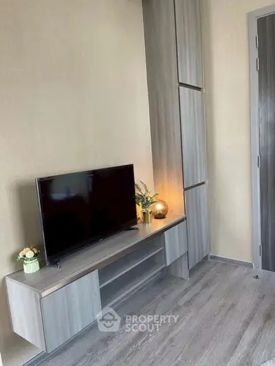 Modern living room with sleek TV stand and stylish decor