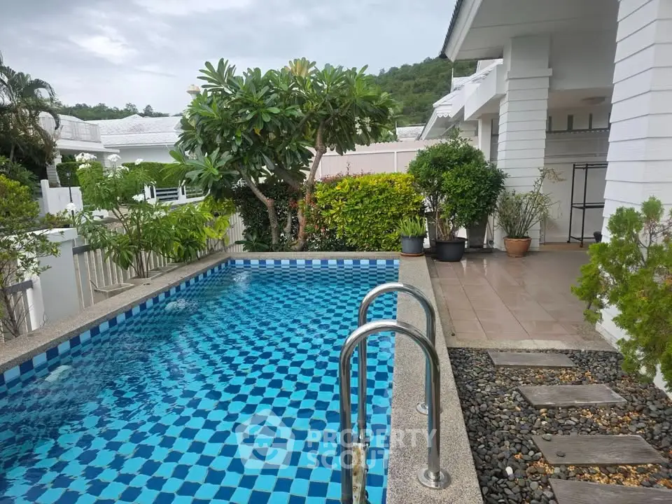 Charming villa with private pool and lush garden, perfect for relaxation and entertaining.