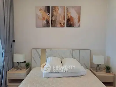 Modern bedroom with stylish decor and comfortable bedding