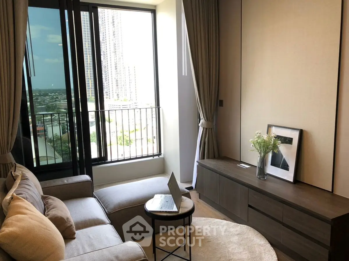 Modern living room with cozy sofa and city view balcony