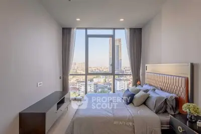 Luxurious bedroom with stunning city view and modern decor