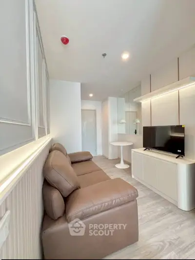 Modern living room with sleek furniture and stylish decor