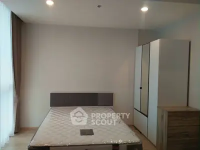 Modern bedroom with minimalist design and natural light