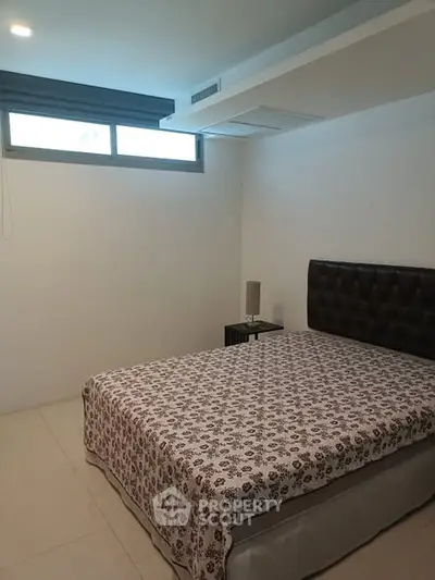 Cozy bedroom with modern decor and natural light