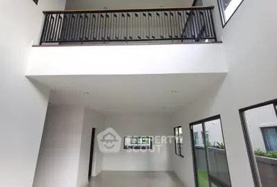 Spacious modern interior with high ceilings and large windows