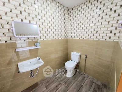 Modern bathroom with stylish tile design and sleek fixtures