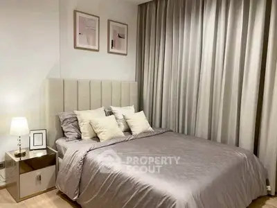 Elegant bedroom with plush bedding and modern decor