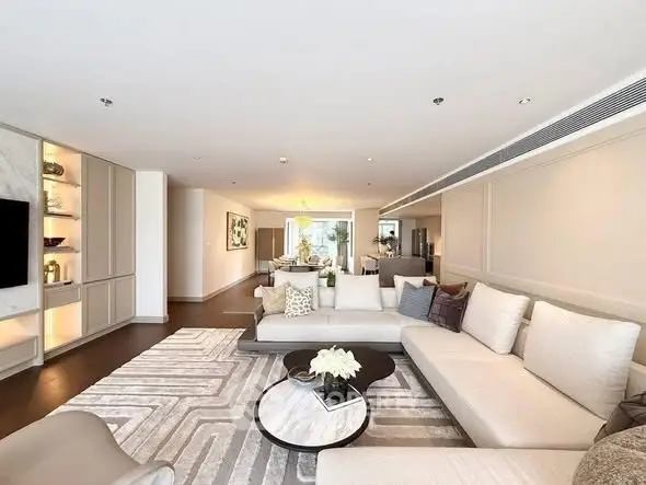 Spacious modern living room with elegant decor and ample natural light