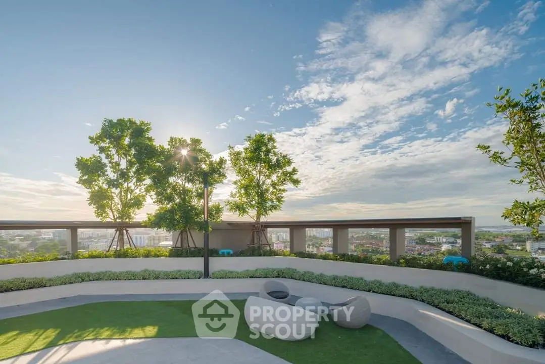 Stunning rooftop garden with panoramic city views and modern seating area.