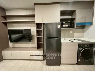 Modern kitchen with sleek appliances and integrated storage solutions