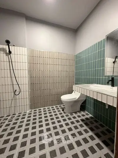 Modern bathroom with stylish tile design and sleek fixtures