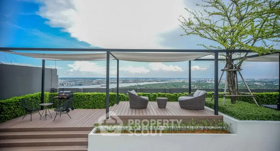 Stunning rooftop terrace with panoramic city views and modern seating area.