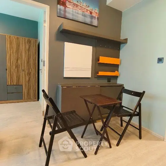 Modern compact living space with foldable furniture and stylish decor