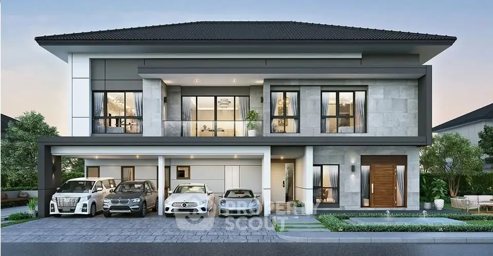 Luxurious modern two-story house with spacious garage and elegant facade.
