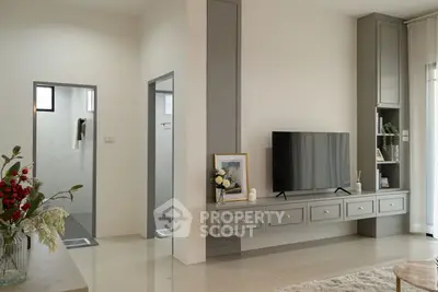 Modern living room with sleek TV unit and elegant decor