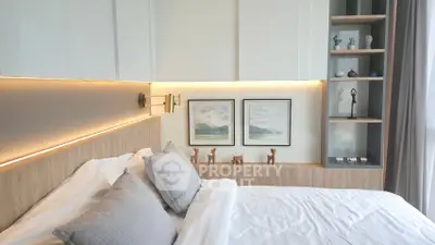Modern bedroom with stylish decor and ambient lighting
