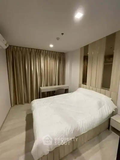 Modern bedroom with elegant decor and cozy ambiance