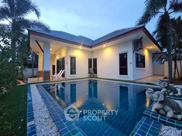 Stunning villa with private pool and lush garden, perfect for luxury living.