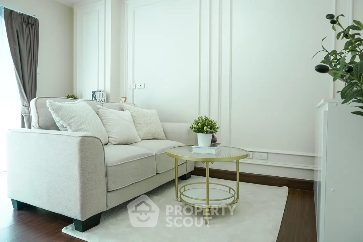 Chic and cozy living room with elegant sofa and stylish decor