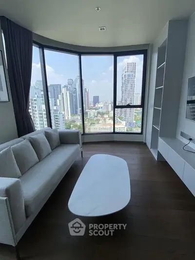 Modern living room with panoramic city view and stylish furniture