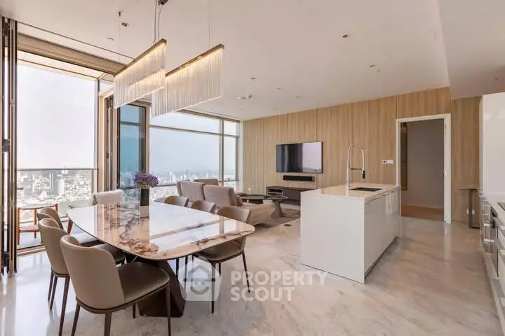 Luxurious open-plan living room with stunning city views and modern kitchen