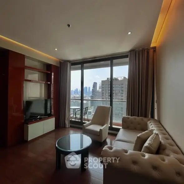 Luxurious living room with city view, elegant furniture, and floor-to-ceiling windows in modern apartment.