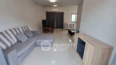 Modern living room with sleek furniture and natural light